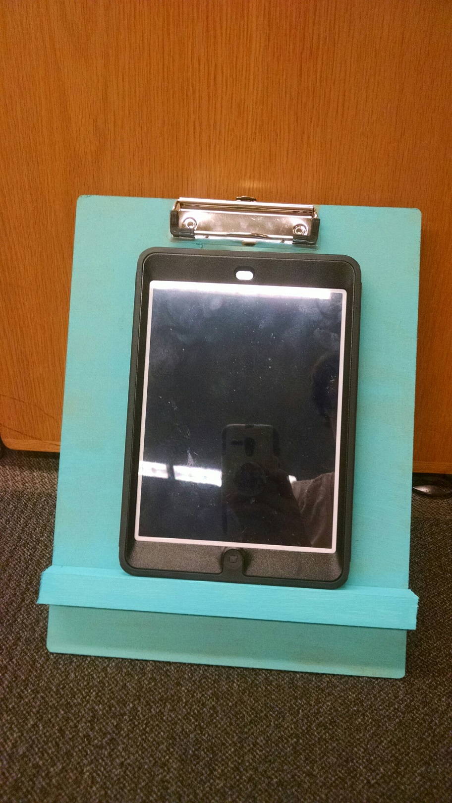 A recipe stand with a tablet on it.