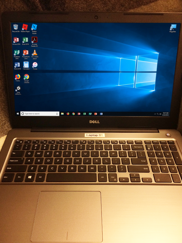 Laptop showing the Windows 10 Desktop.