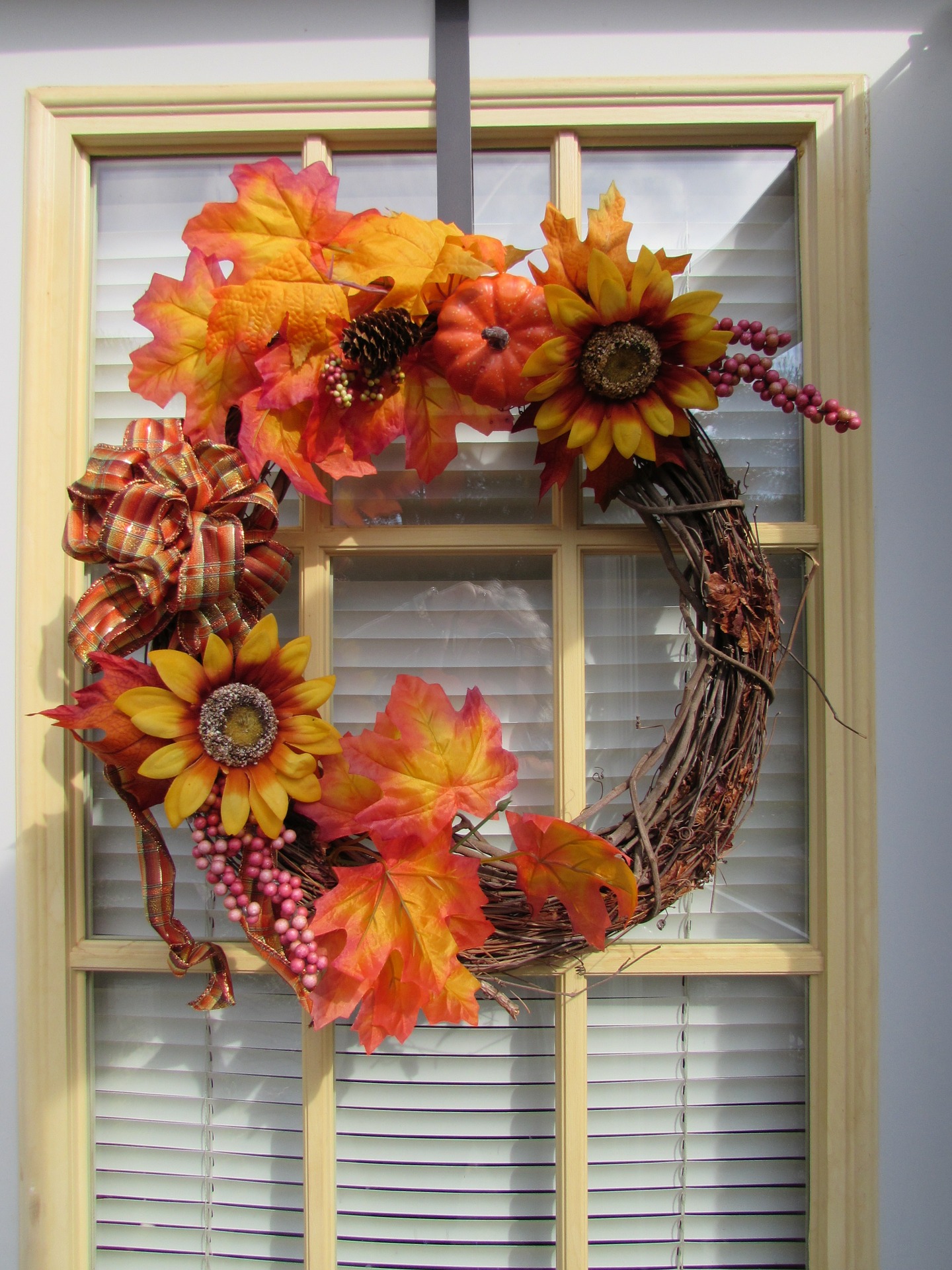 Fall wreath on a door.